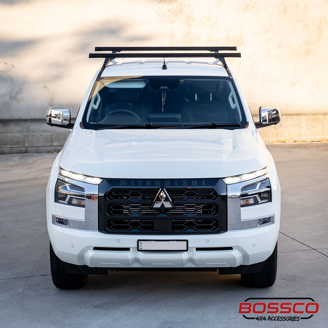 Roof Racks installed on a new white Mitsubishi Triton, a white Ute parked at Bossco 4x4 Accessories car park