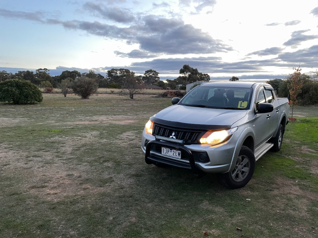 Bossco Nudge Bar installed on a silver 4WD Ute ready for camping