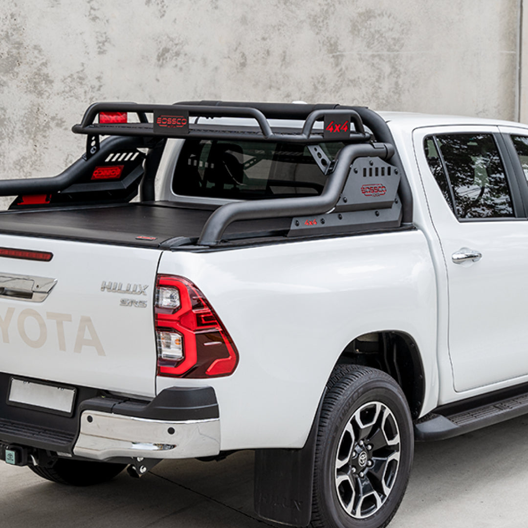 Bossco 4x4 Accessories installed Electric Roller Tonneau Cover with Ute Sports Bar on a white toyota Hilux