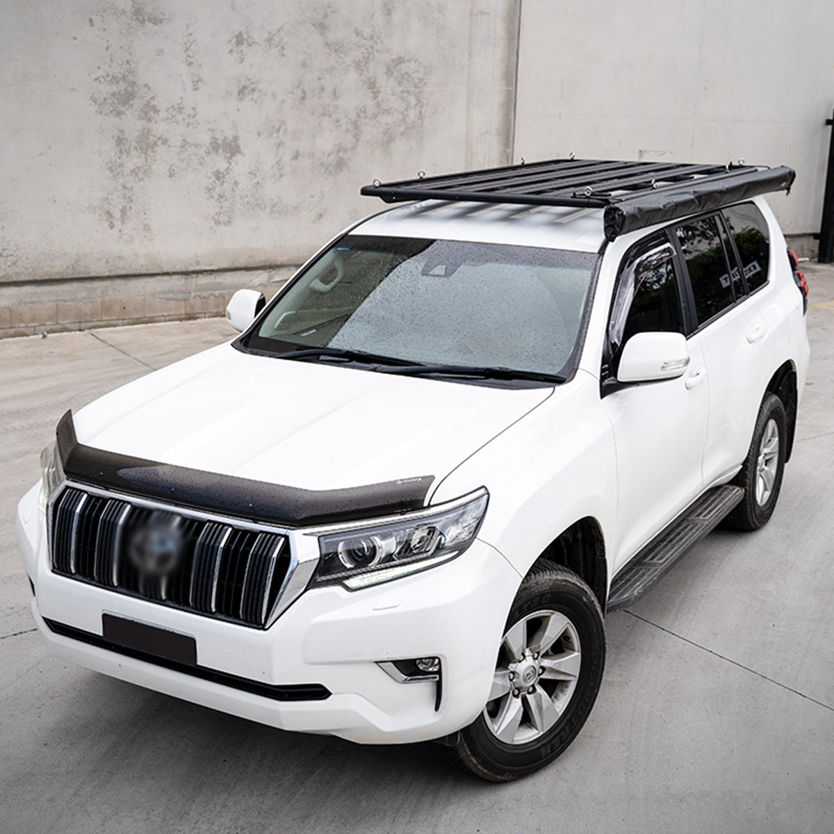 Platform Roof Rack Basket installed on a white SUV by Bossco 4x4 Accessories showing a black bonnet protector by Bossco
