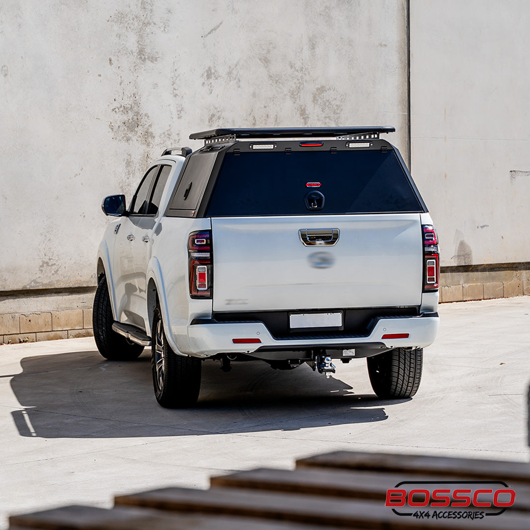 Ute Canopy installed on a white pick up truck by Bossco 4x4 Accessories along with Canopy Roof Racks also installed by Bossco 4x4.