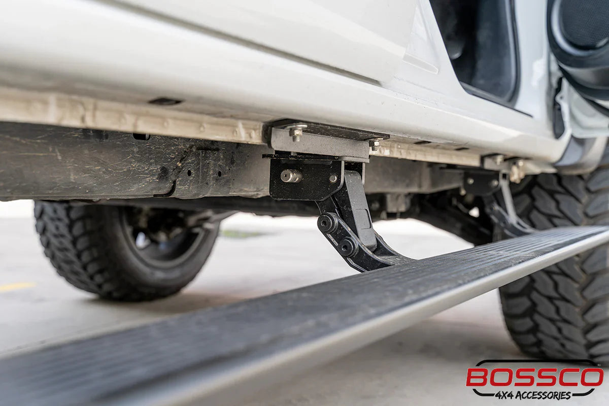 Electric Side Steps installed by Bossco 4x4 Accessoires on a white 4WD