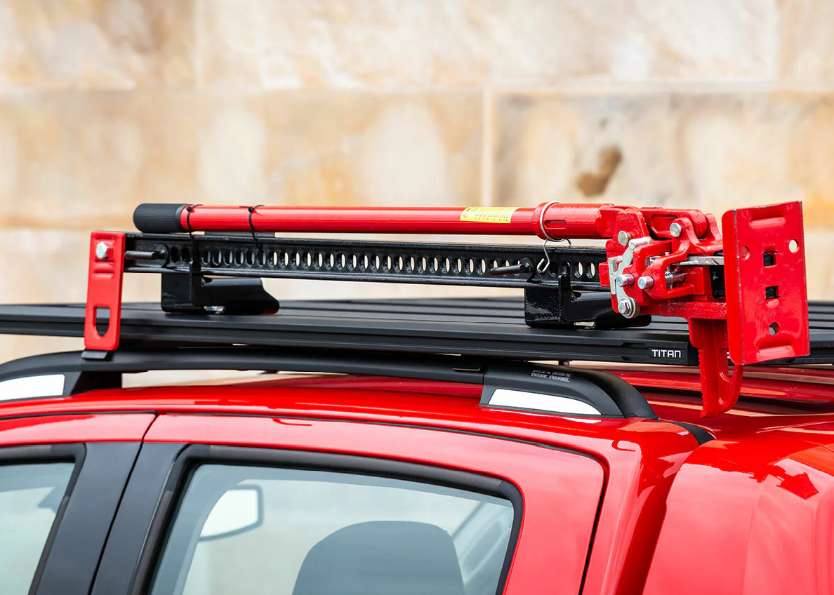 Hi Lift Jacks by Bossco 4x4 Accessories on top of red ute pick up truck