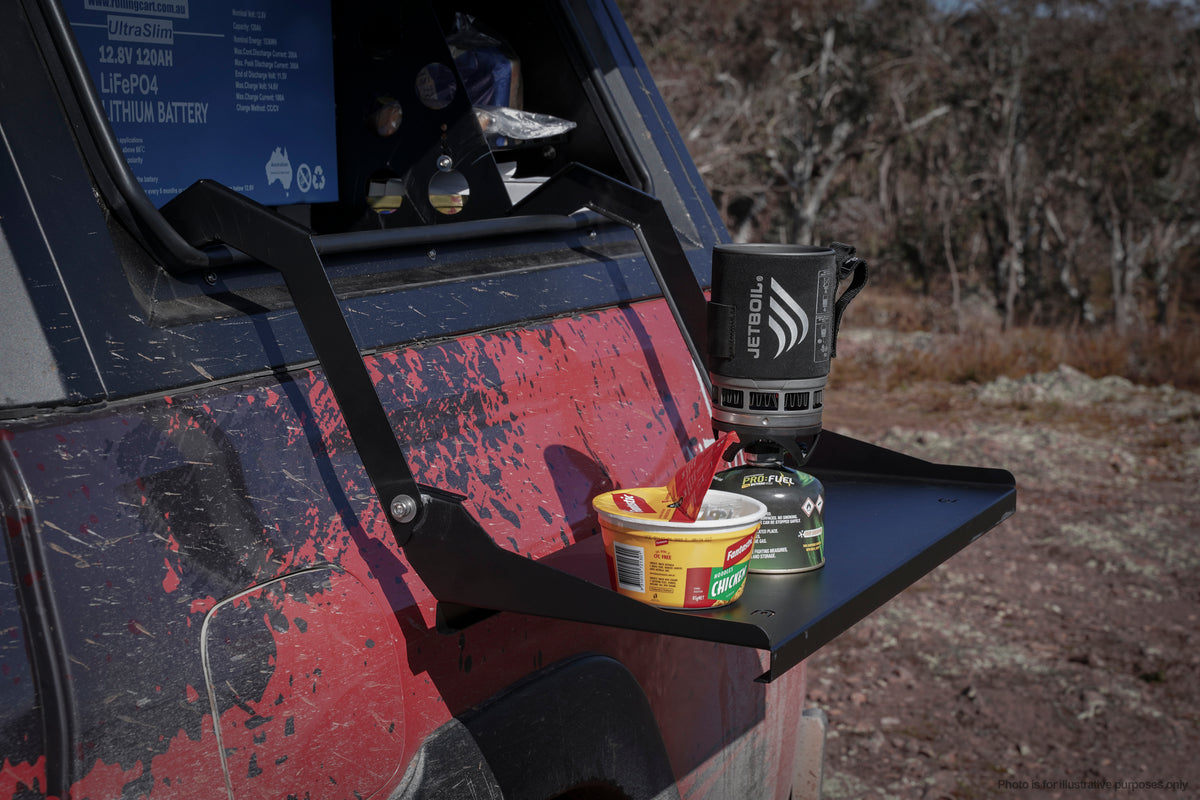 Fold-down accessory table fitted inside a Bossco canopy