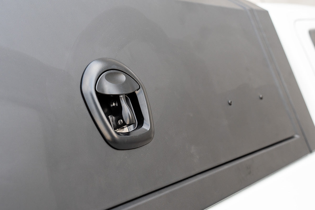 Whale tail compression lock on a Bossco canopy door