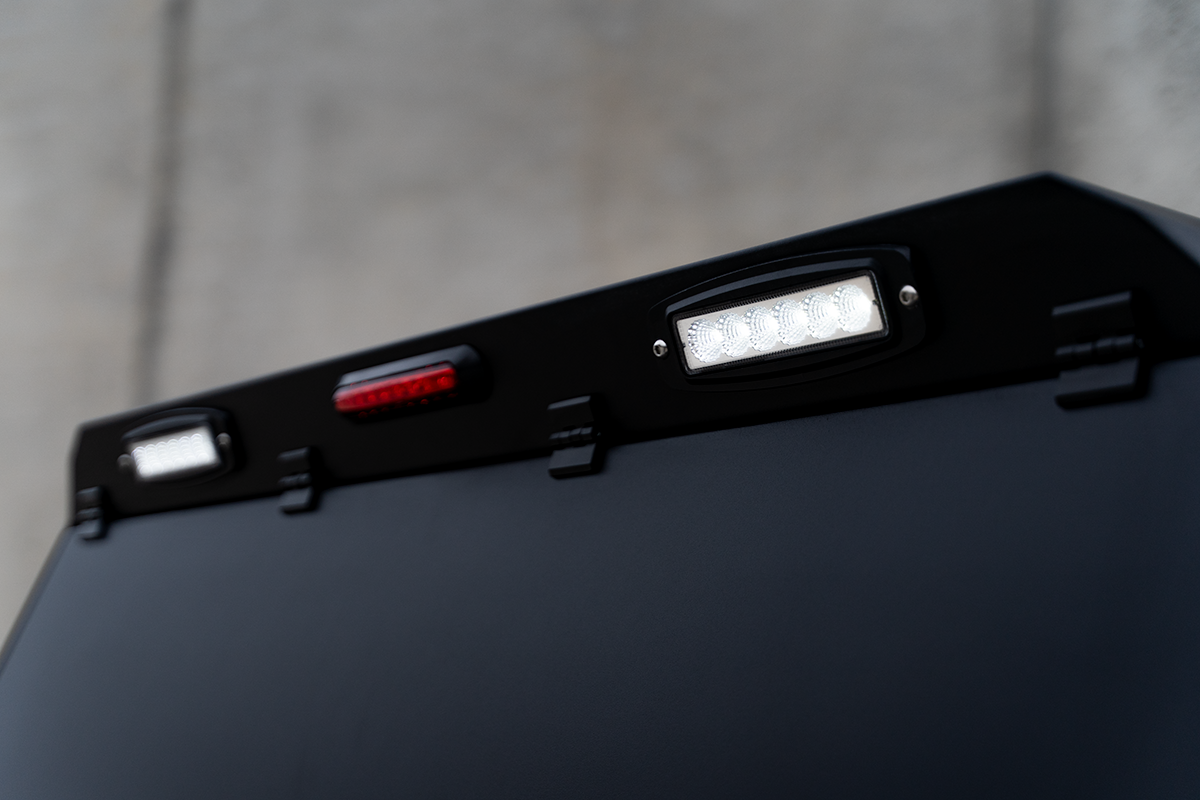 Integrated rear LED worklights and third brake light on the canopy