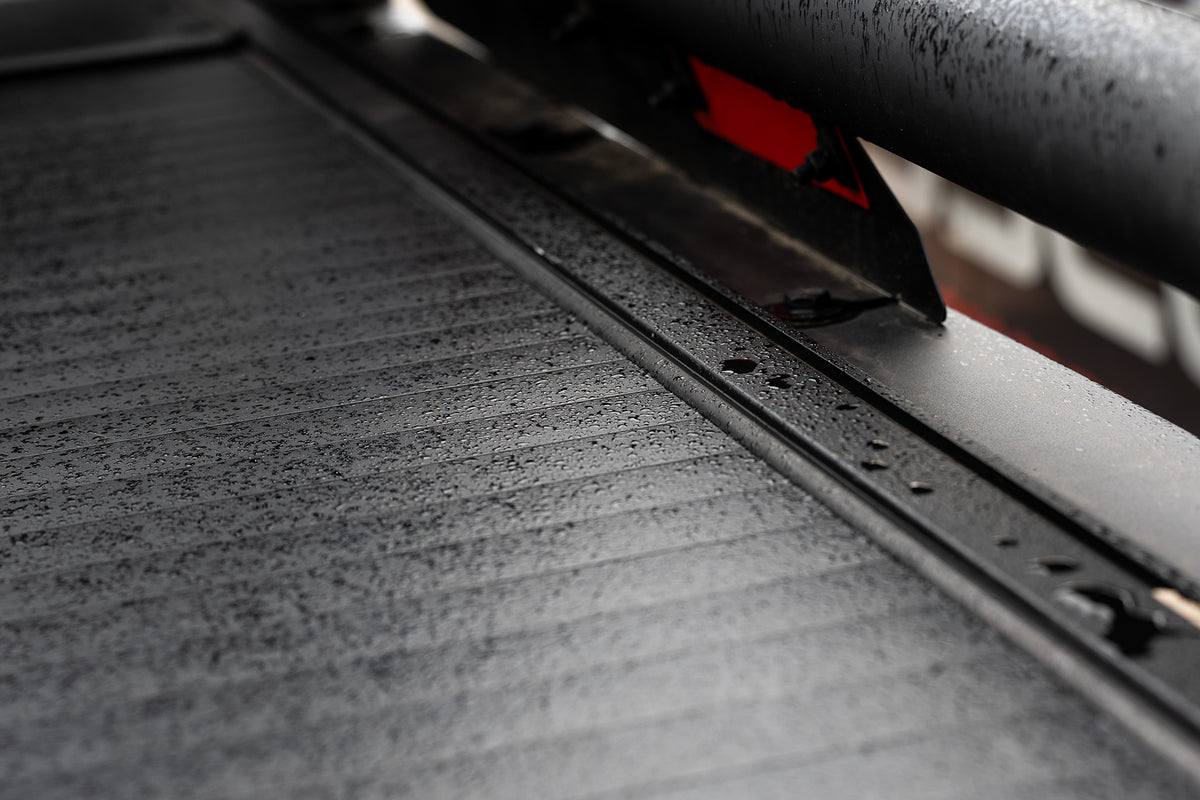 Water beading on the aluminium surface of a Bossco roller shutter