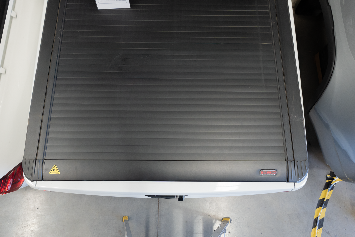 Bossco electric roller cover with aluminium slats and closing bar